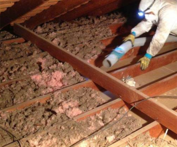 Attic insulation removal