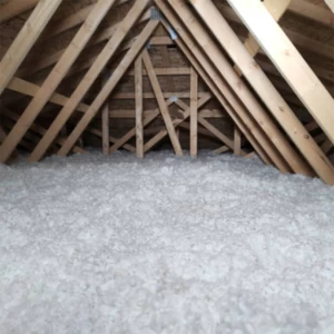 Loose-fill insulation across an attic floor