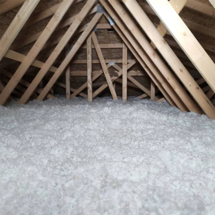 Loose-fill insulation installed evenly across an attic floor