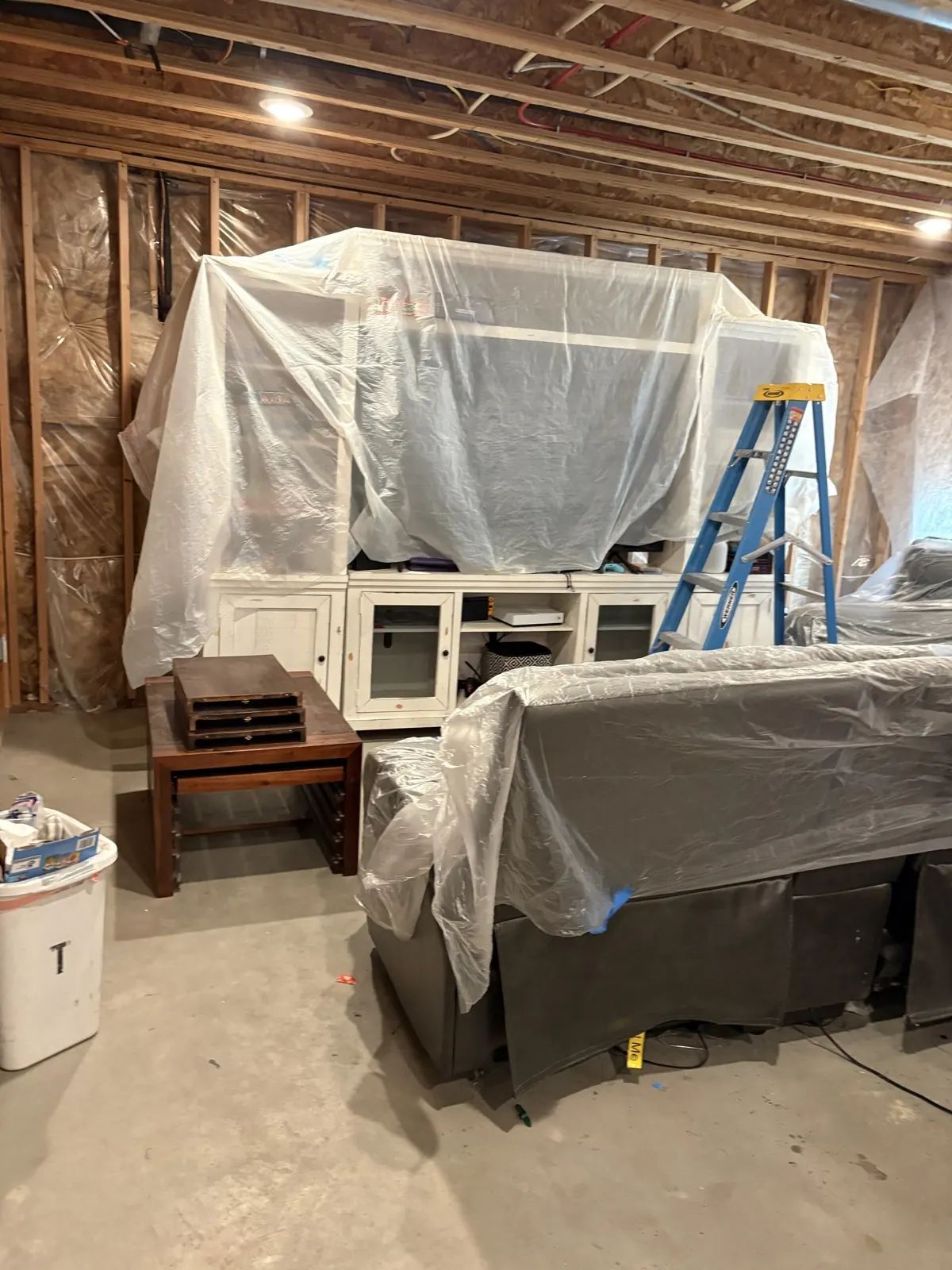 Household belongings protected before insulation work begins